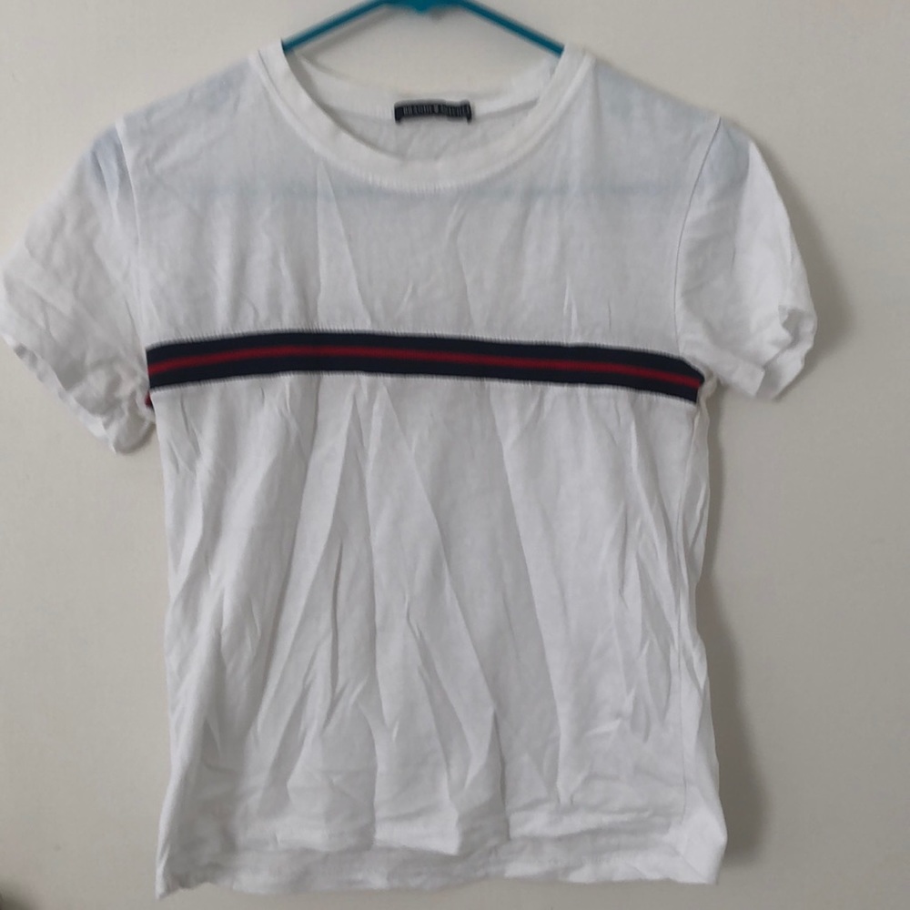 white t shirt with blue and red stripe